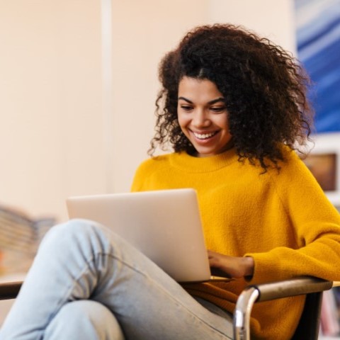 Woman Using Laptop